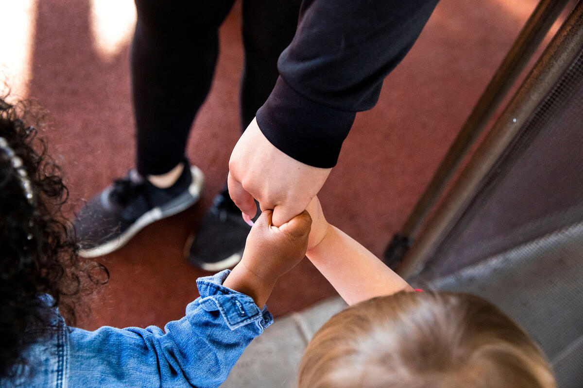 kids holding hands