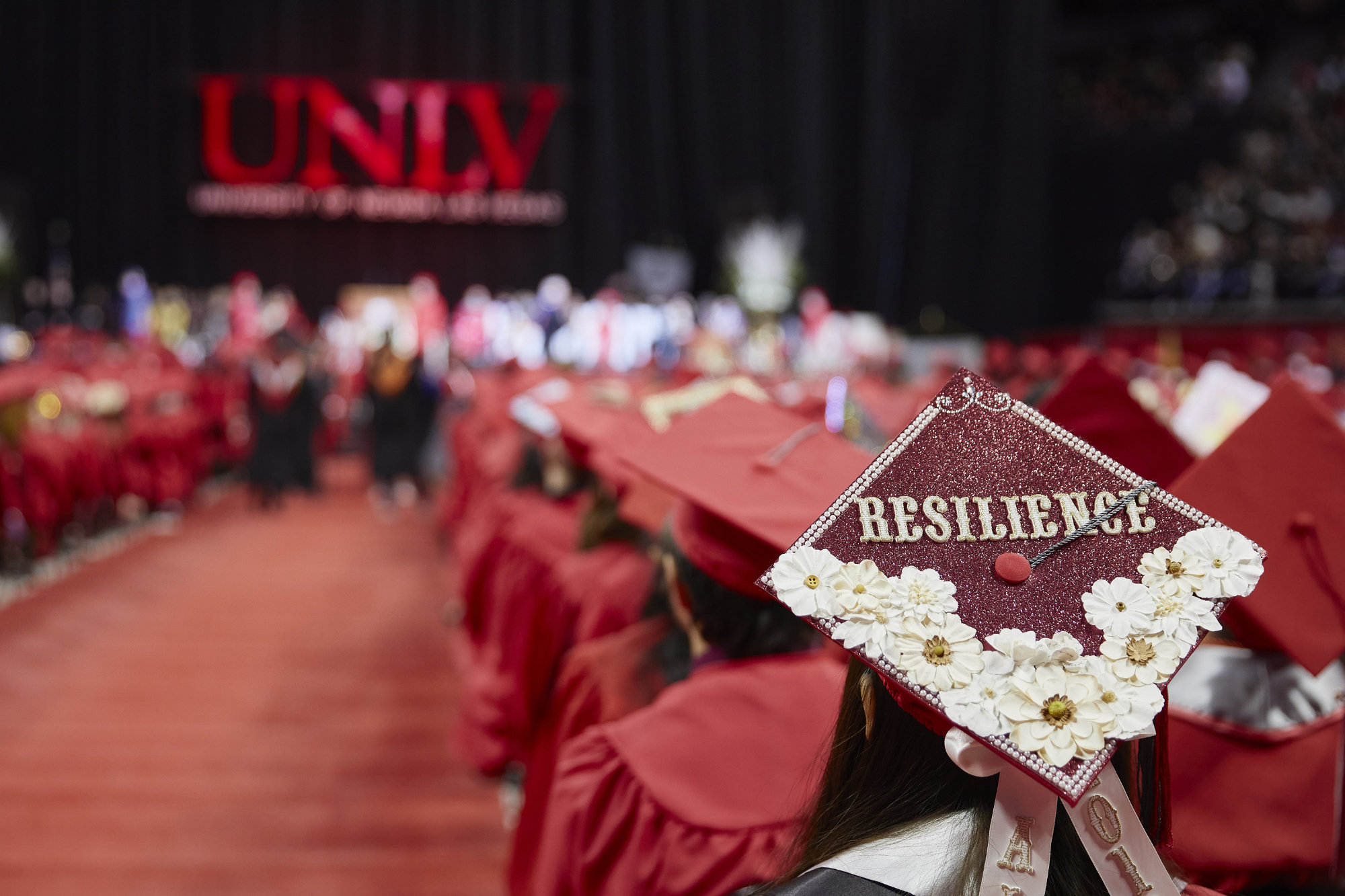 A group of prospective graduates prepare for their graduation ceremony