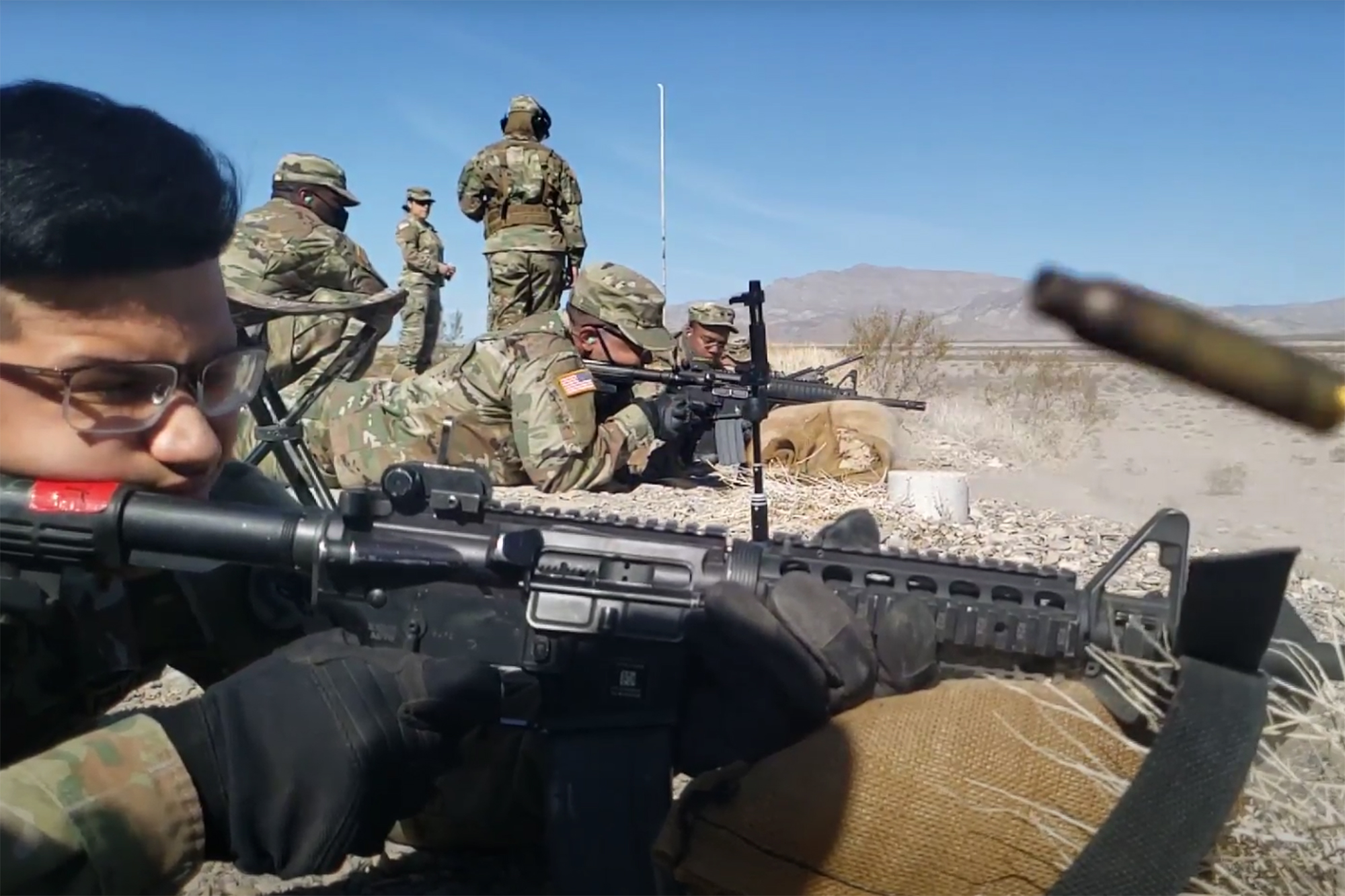 Soldier shooting a rifle