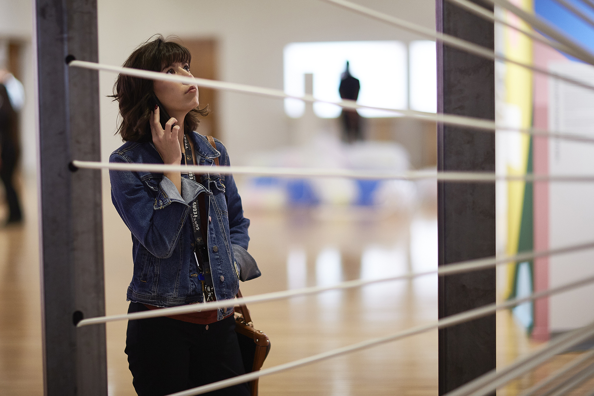 girl looking at artwork