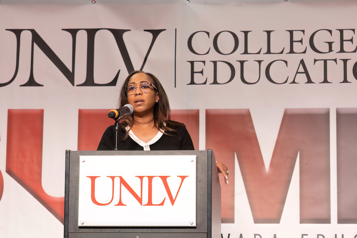 Lady Speaking at Podium