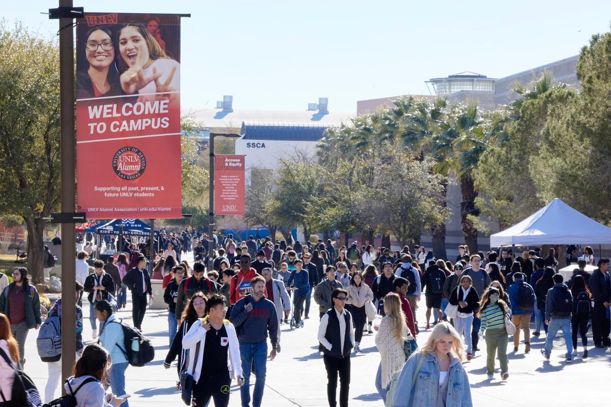 Students walking on campus on the first day of spring semester.