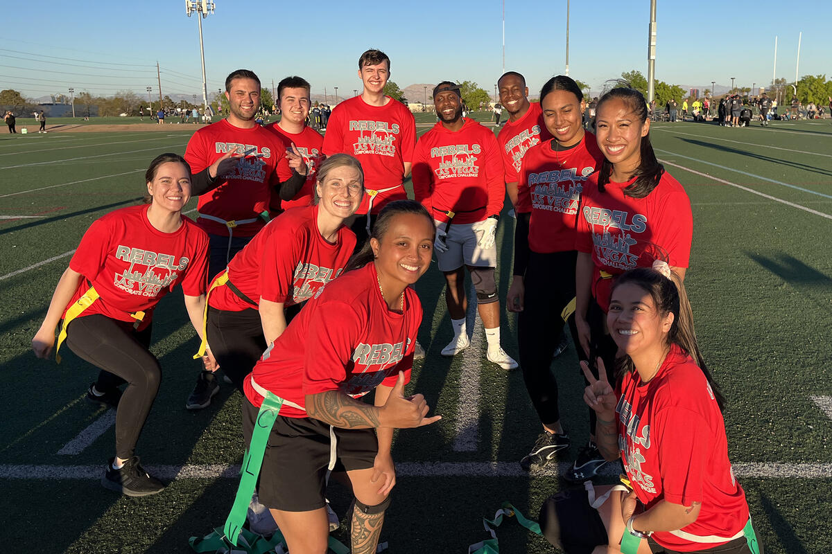 Group of men and women representing UNLV's flag football team for the Corporate Challenge