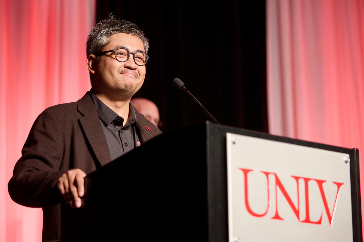 man talking at podium