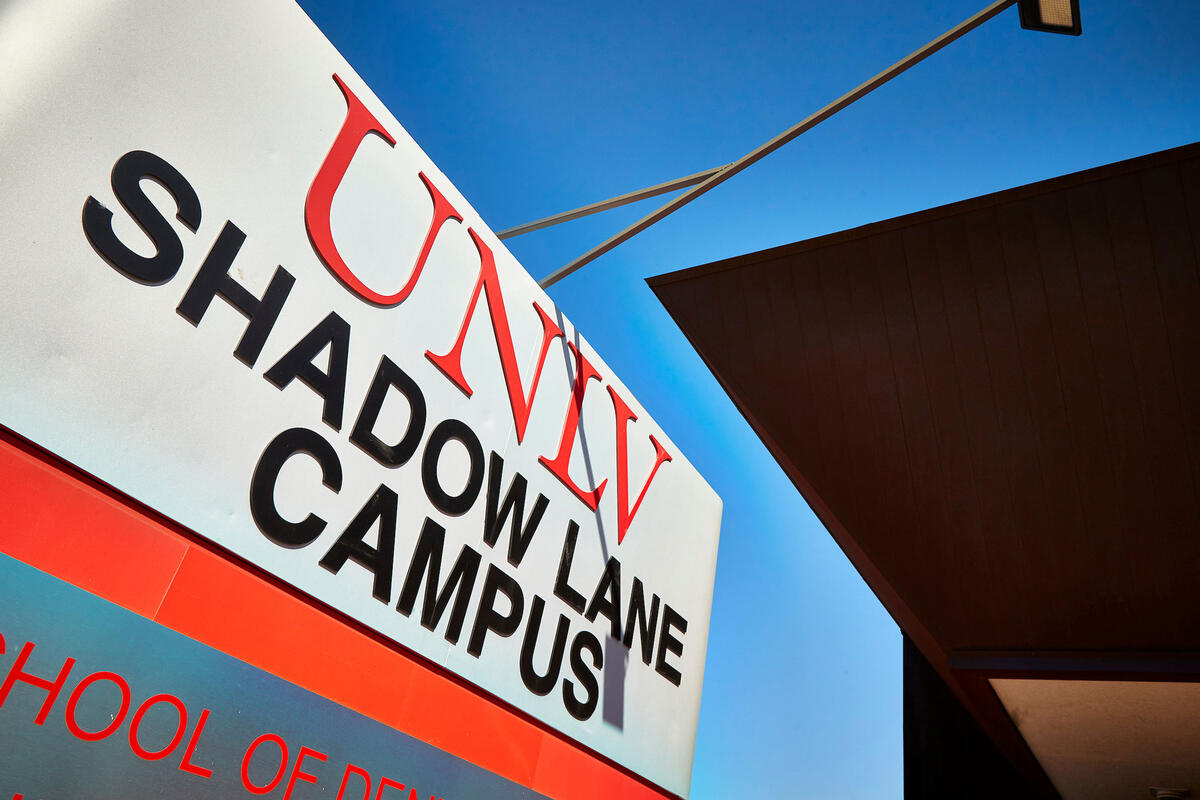 A sign in front of a building reads &quot;UNLV Shadow Lane Campus&quot;