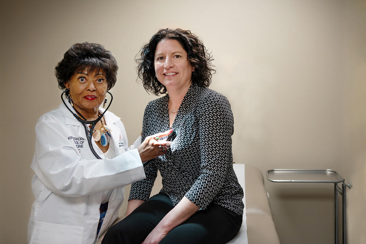 Dr. Beverly Neyland (left), professor of pediatrics, and Dr. Rebecca Scherr, interim chair of the department of pediatrics.