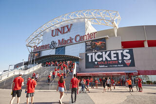 A view of the Thomas &amp; Mack, with event attendees walking in.