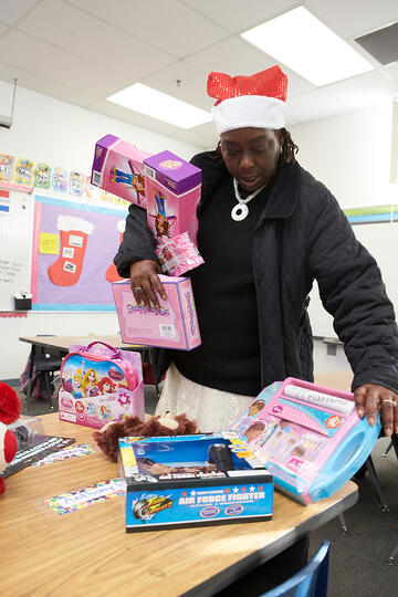 Cassandra Davidson-Bryant delivers toys to a Paradise Elementary School classroom.