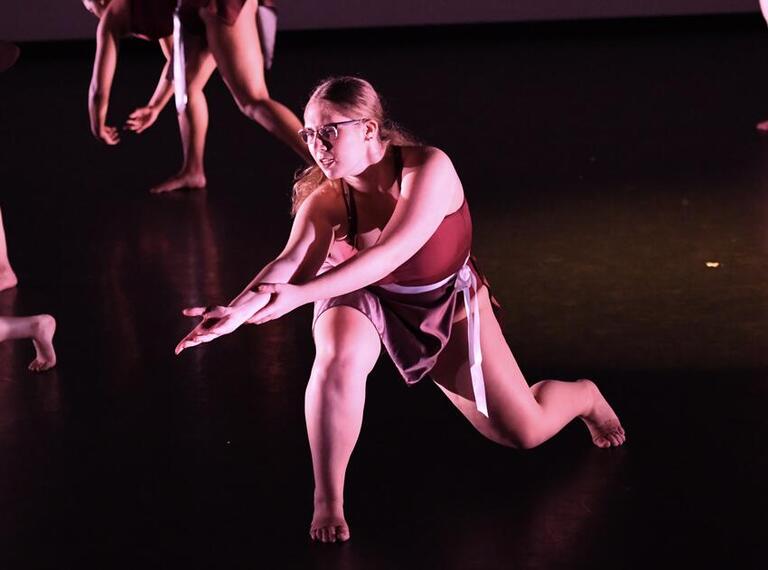 UNLV dance student performing on stage.