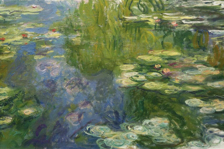 A painting of a pond with lilies is in this image.