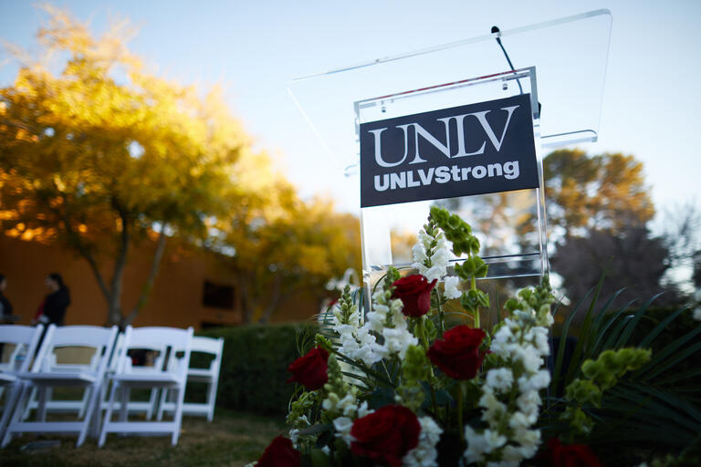 vigil setup with sign that reads UNLV Strong
