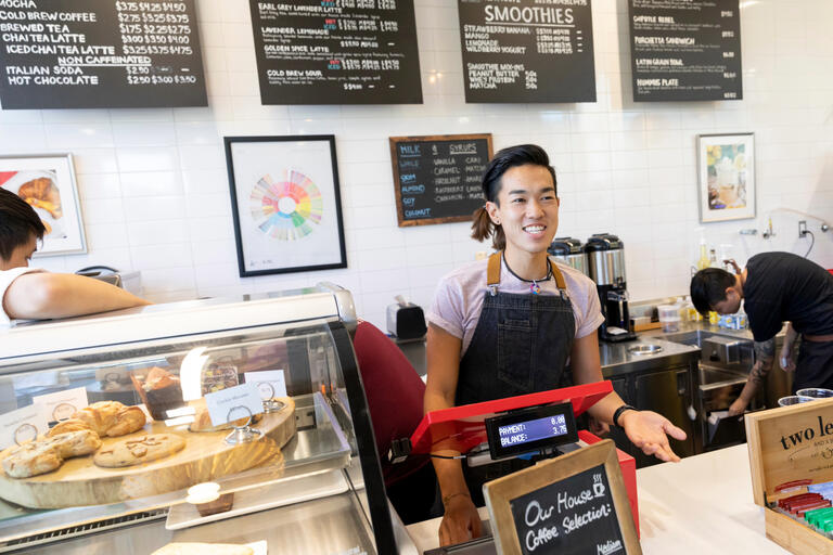 A student barista working at UNLV Rebel Grounds coffee shop.