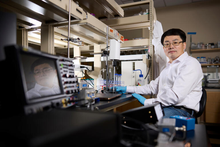 A portrait of assistant professor Zhange Feng in the Department of Chemistry and Biochemistry