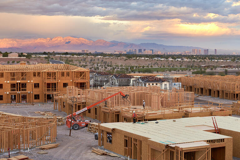 construction site with sunset in background