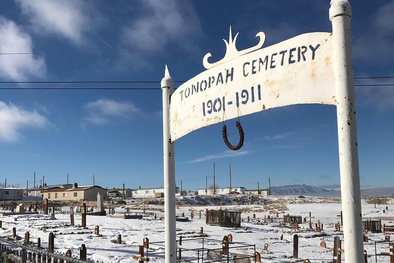 Cemetary with sign that reads 'Tonopah Cememtary 1901-1911.'