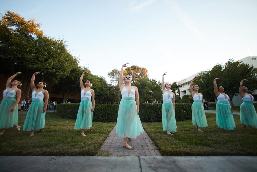 Ballet dancers in the rose garden